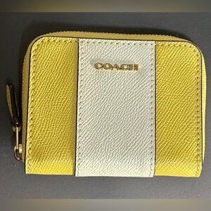 NWOT Coach Vibrant Yellow and White Pebbled Leather Zip around Mini Wallet.